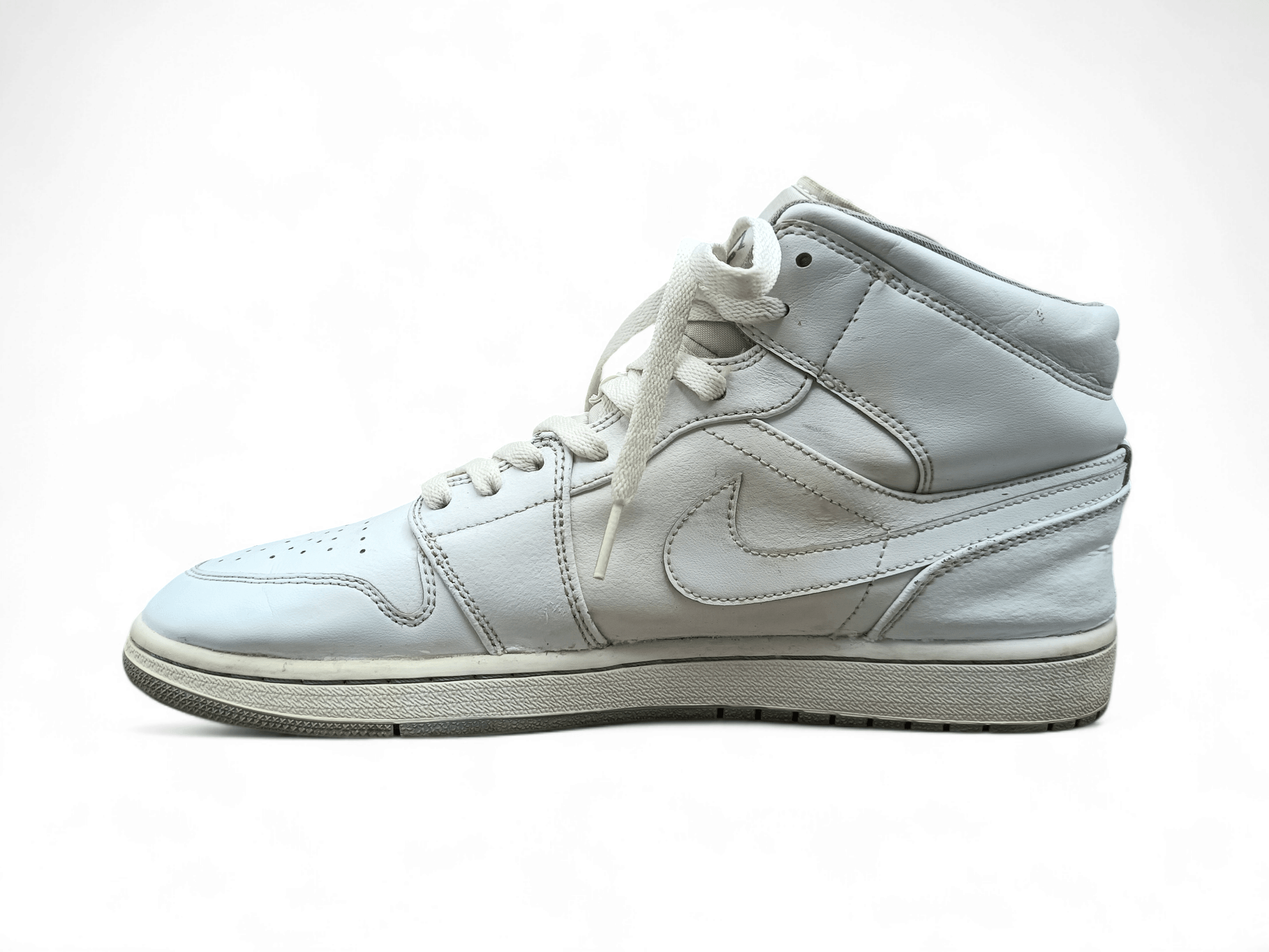 Air Jordan 1 Mid Triple White stylish footwear Nike side view